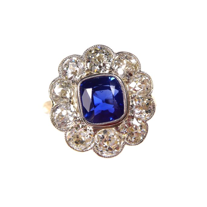 Sapphire and diamond cluster ring, with a 2.25ct old cushion cut Kashmir sapphire | MasterArt